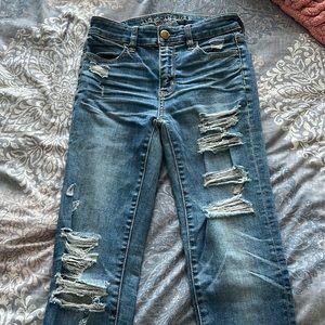 American Eagle ripped skinny jeans.